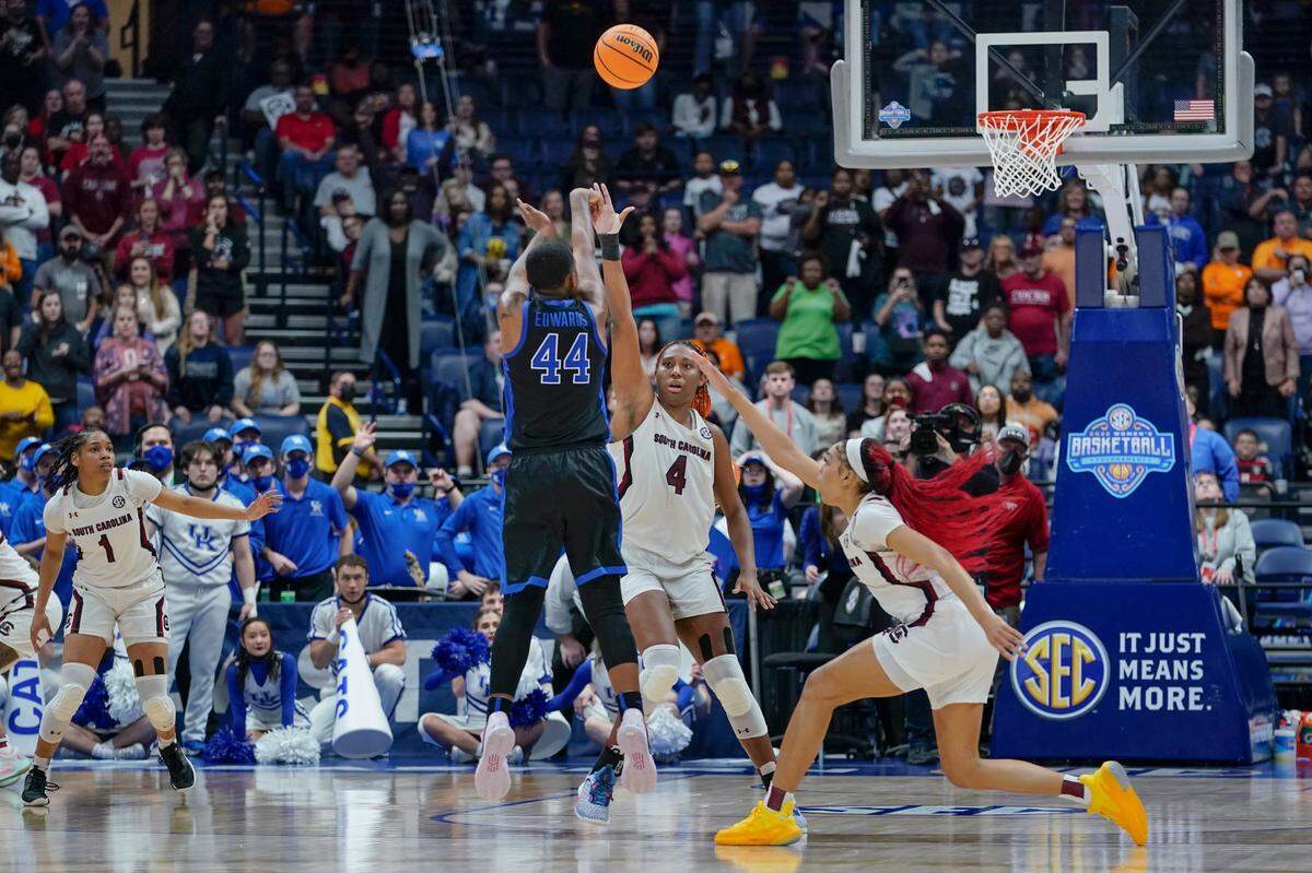 Kentucky’s Dre’una Edwards (44) makes the winning shot to beat South Carolina in the Southeastern Conference tournament championship game. “Our players were very composed and confident because we had went over it a thousand times, so we knew exactly what we were looking for, and thank God the shot went in,” head coach Kyra Elzy said.