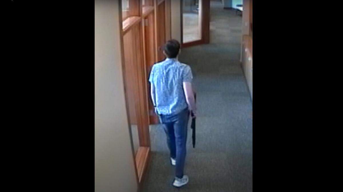 Bank security footage shows Connor Sturgeon with an AR-15 he used to kill five people and wound several others in an April 10, 2023 shooting at Old National Bank in Louisville, Ky., according to Louisville police.