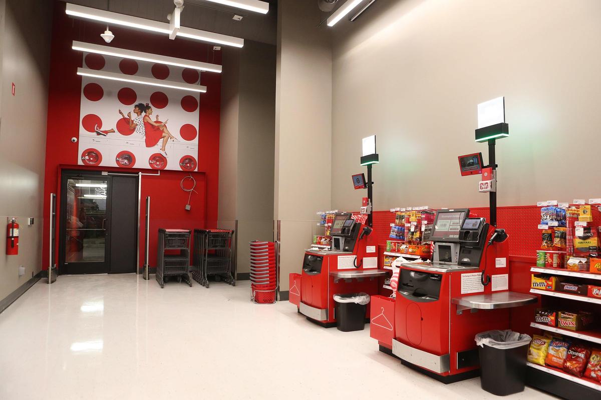 Self-checkout terminals available by the parking garage entrance give guests an additional option Tuesday at the new Target store on the UK campus. Photo by Matt Goins
