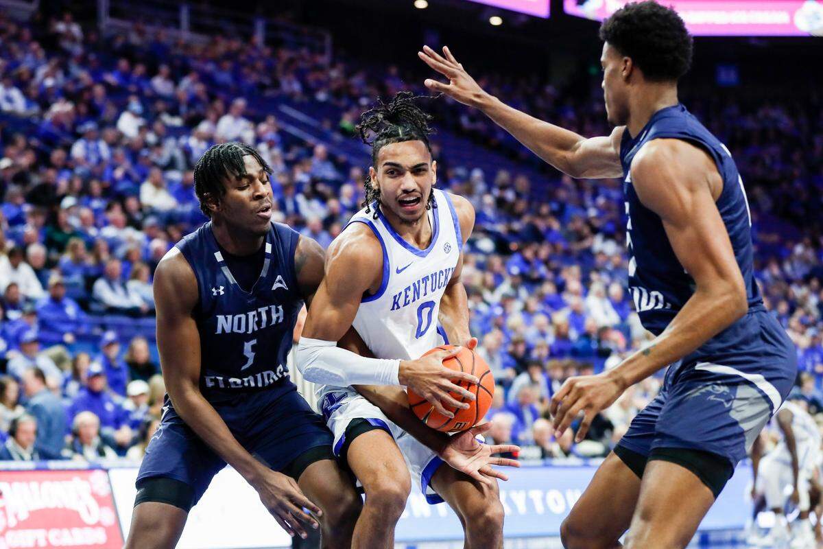 Kentucky’s Jacob Toppin, center, competes against North Florida on Wednesday, Nov. 23, 2022, at Rupp Arena in Lexington, Kentucky.