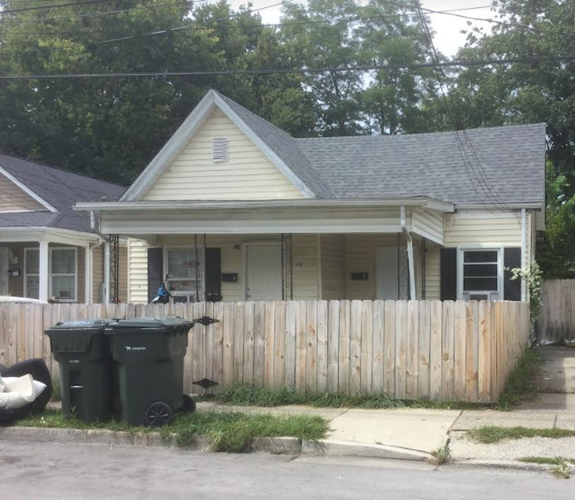 Mitchell OZ Holdings LLC owns the small, yellow duplex at 451 Chestnut St. in Lexington.