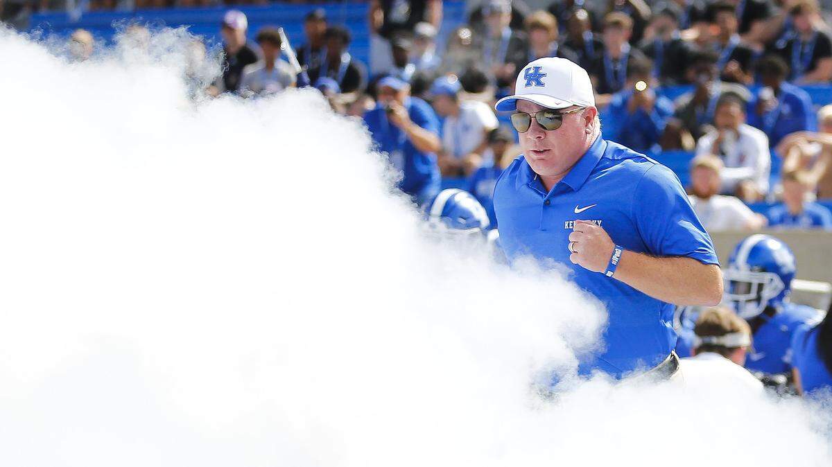 Kentucky head coach Mark Stoops took the field during team intros before a game against the Murray State Racers.