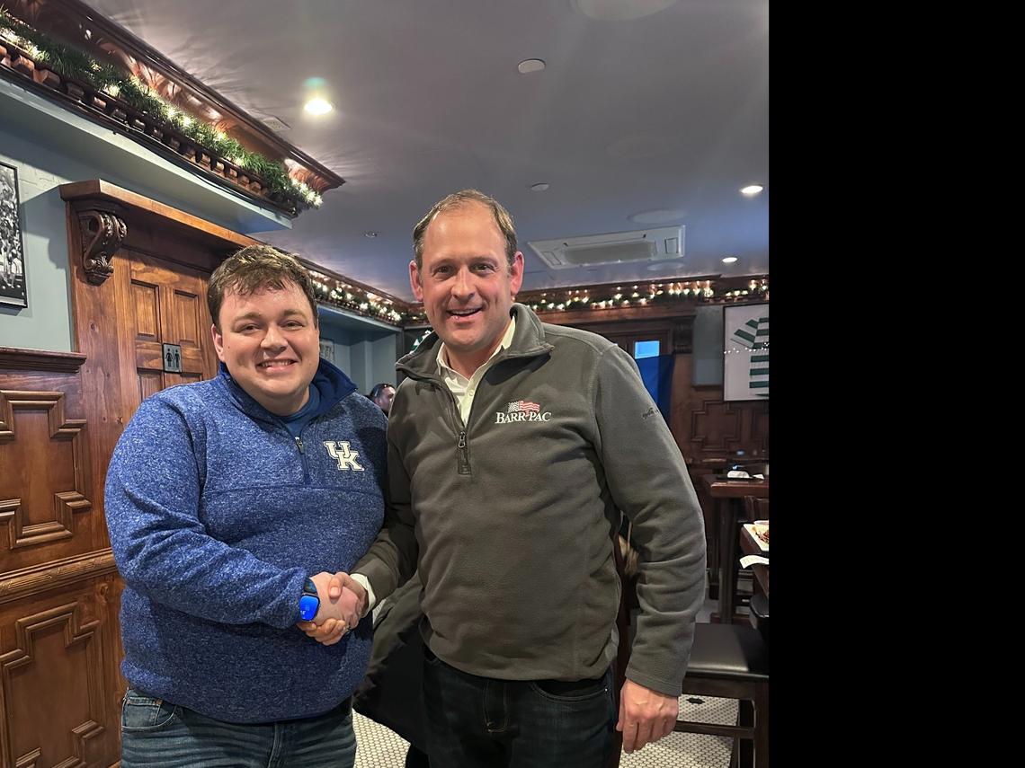 Zebulon Vance, the president of the New York City UK Alumni Club, shakes hands with Kentucky Republican Congressman Andy Barr at Jack Demsey’s, a bar and restaurant in New York City. Barr watched the Kentucky-Michigan men’s basketball game at Jack Demsey’s.