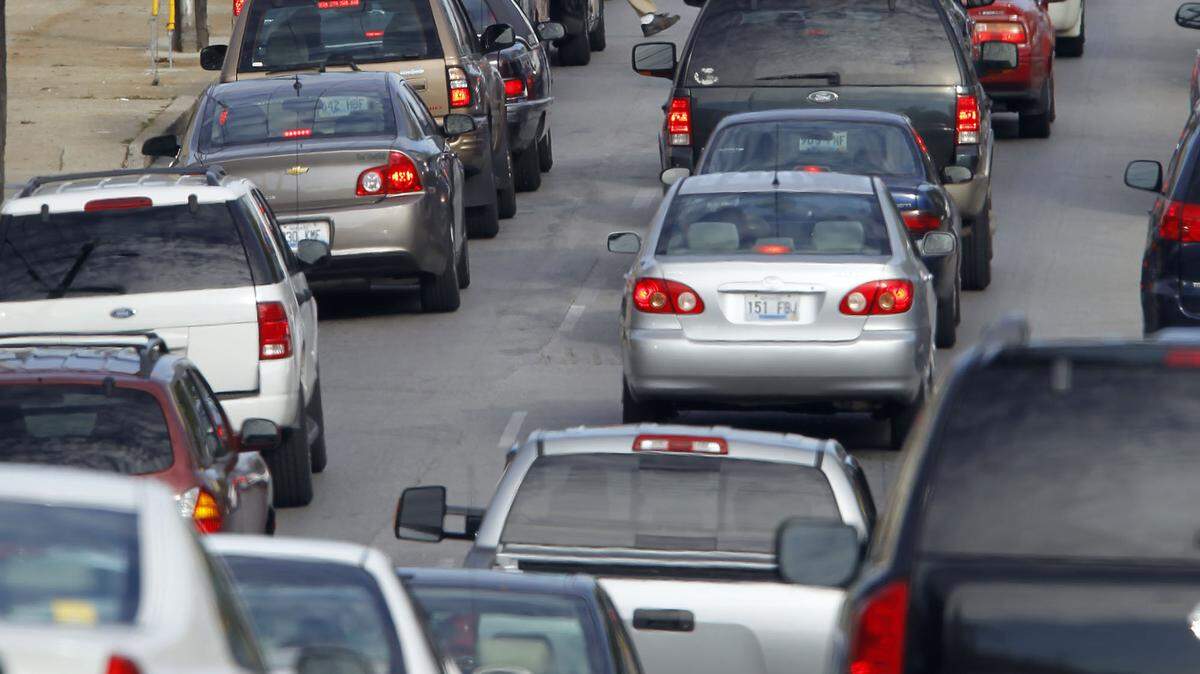 Downtown traffic bottlenecked during the morning rush hour as Get Motivated attendees flooded High Street and other routes toward Rupp Arena in 2011.