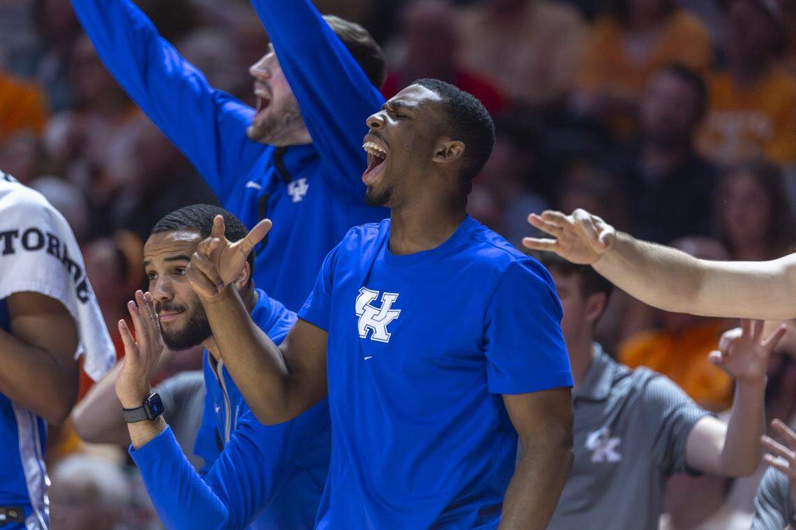 Kentucky guard Lamont Butler cheers with his teammates during Tuesday’s win against Tennessee at Thompson-Boling Arena in Knoxville, Tenn.