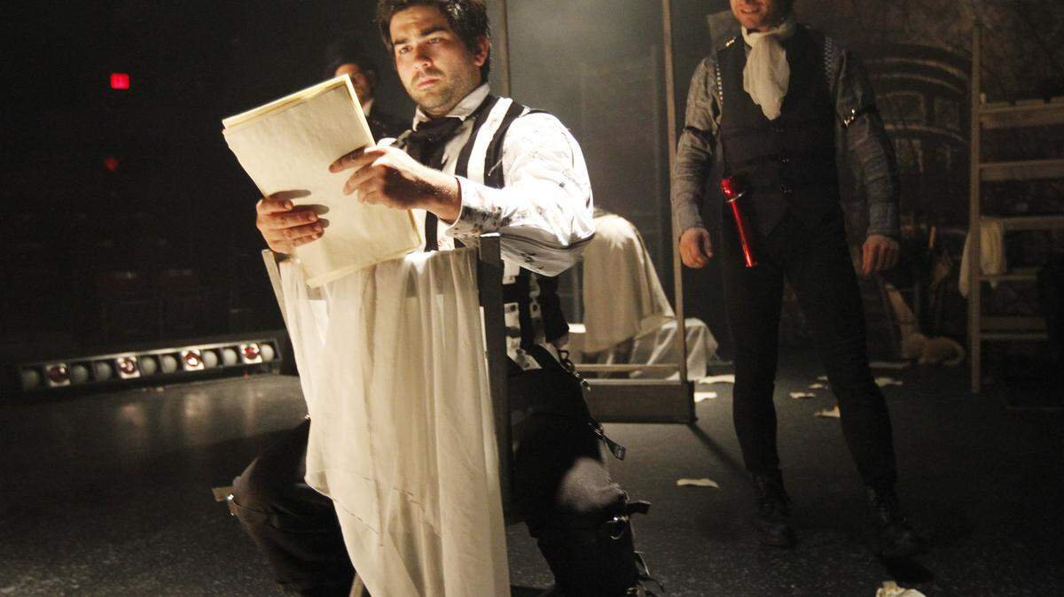 In The Tales of Edgar Allan Poe, Jim Short, left, plays the title role, and Michael Whitten plays many roles. The Lexington Children's Theatre production incorporates three Poe stories: The Tell-Tale Heart, The Fall of the House of Usher and The Cask of Amontillado.  