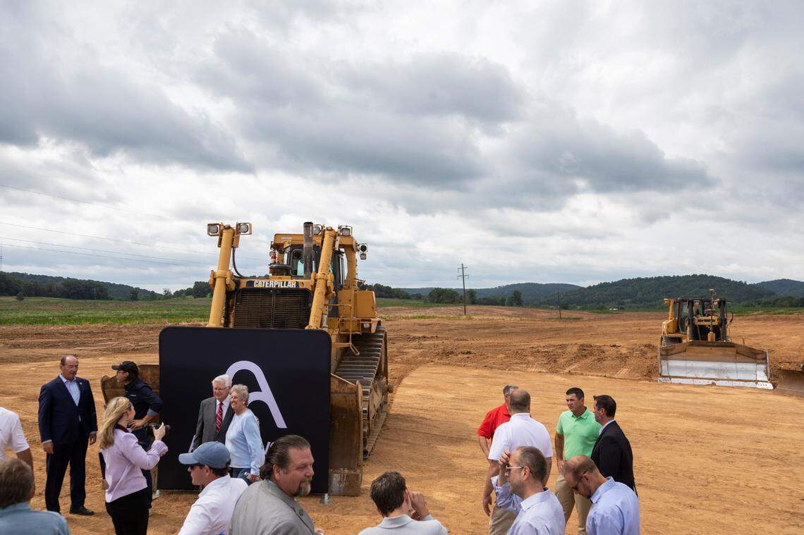 Politicians, officials and employees mingle and talk after a groundbreaking ceremony at the site of AppHarvest’s new facility in Somerset, Ky., Monday, June 21, 2021. The company announced two new facilities today one in, a second facility in Morehead and a 30-acre indoor berry farm in Somerset. “We cannot build and grow fast enough to meet market demand,” CEO Jonathan Webb said. These two facilities are part of AppHarvest’s goal to have 12 indoor farms by the end of 2025. Construction for both the Somerset and Morehead facility are anticipated to finish by the end of 2022.