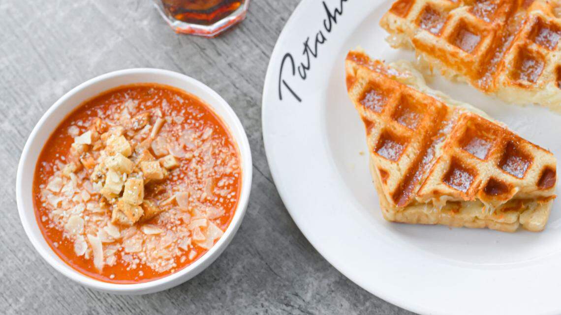 Cafe Patachou is a breakfast and lunch restaurant from Indiana. The menu includes sandwiches such as the Waffled Grilled Cheese, made with Cheddar and Swiss on “waffled” sourdough with a Parmesan crust, served with a cup of tomato artichoke soup.