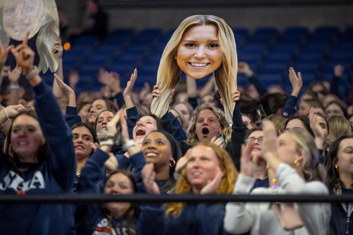 The Sacred Heart student section supports its team during Friday’s quarterfinal against Owensboro Catholic.