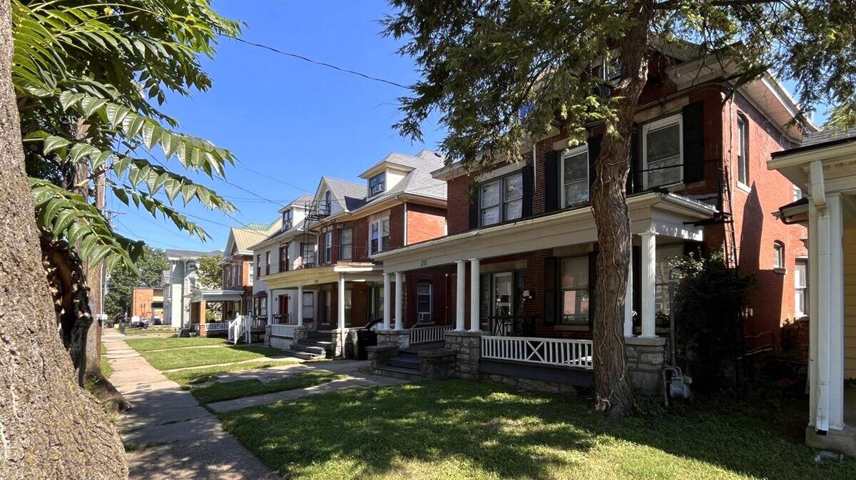 A block of historic houses on Maxwell Street will be demolished to make way for a seven story apartment building. (Photo courtesy of Zak Leonard)