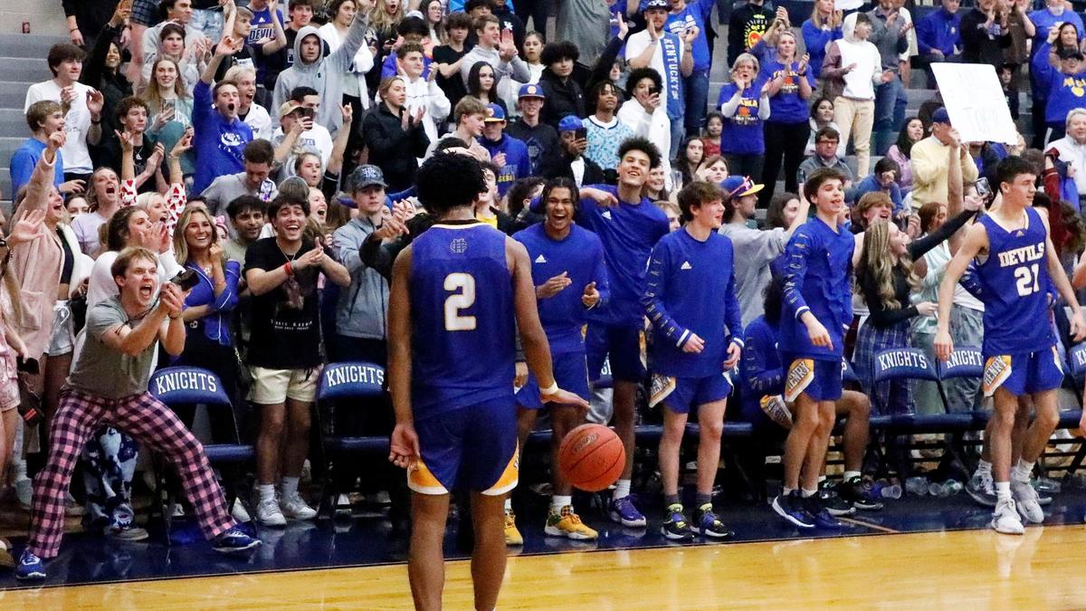 Henry Clay’s Aziel Blackwell (2) celebrates with the Blue Devils student section as the final seconds tick off the clock Tuesday night at Lexington Catholic. Henry Clay is two wins away from its first Sweet 16 appearance since 2005.