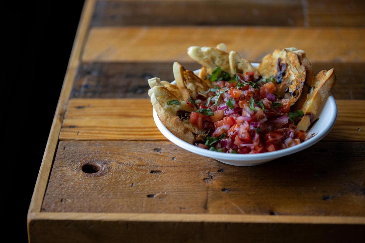 Bruschetta at Rolling Oven inside the kitchen at Mirror Twin Brewing Co.