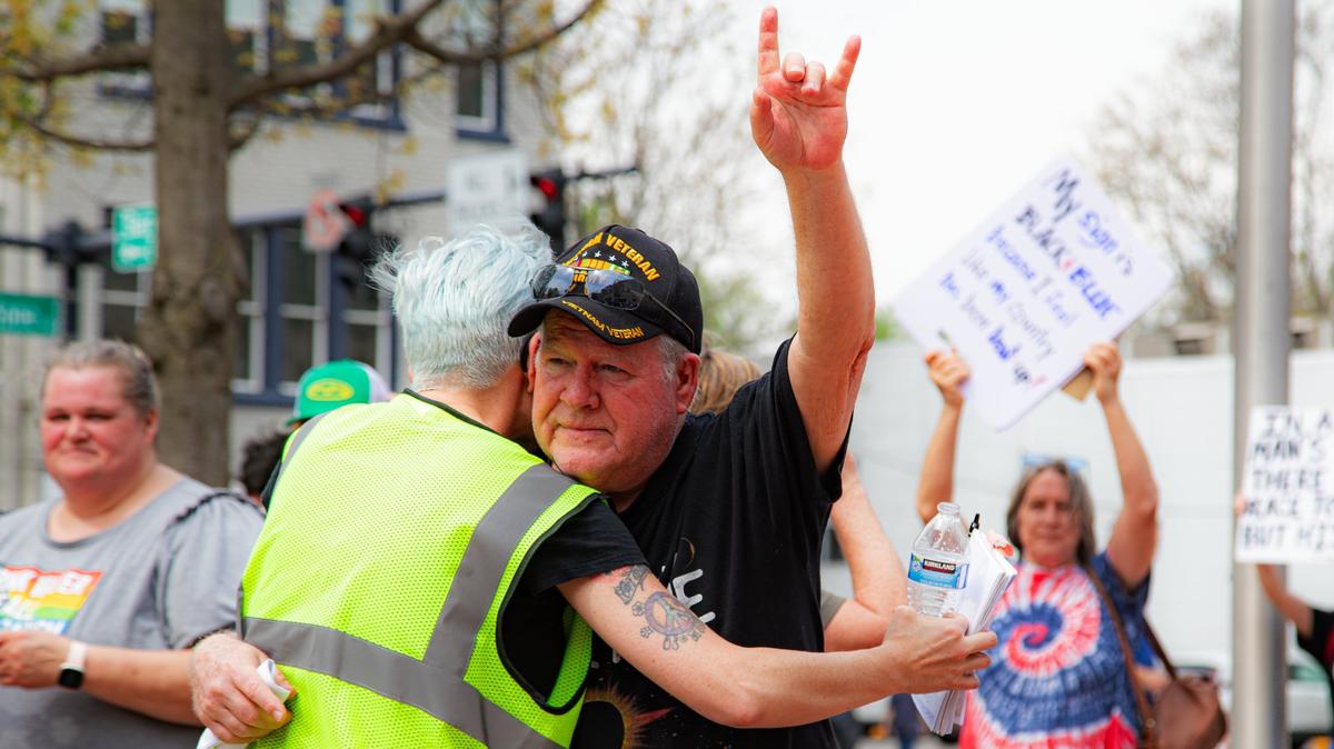 Vietnam veteran Bob Hoeller gets a supportive hug after shedding tears during his testimony about honoring America through cohesiveness and holding government officials accountable during the “No Kings Then, No Kings Now” Peaceful March and Protest in front of the Robert F. Stephens Courthouse, downtown Lexington, Ky, on April 19, 2025.
