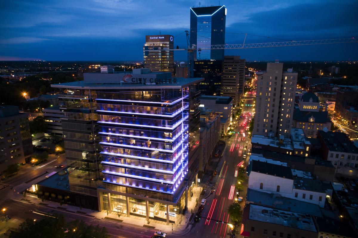 City Center is illuminated shortly after sunset in Lexington, Ky., Thursday, May 16, 2019. City Center is one of the first buildings to participate in LexLights!, a new project to light up downtown sponsored by the Downtown Lexington Partnership and the Downtown Lexington Management District.
