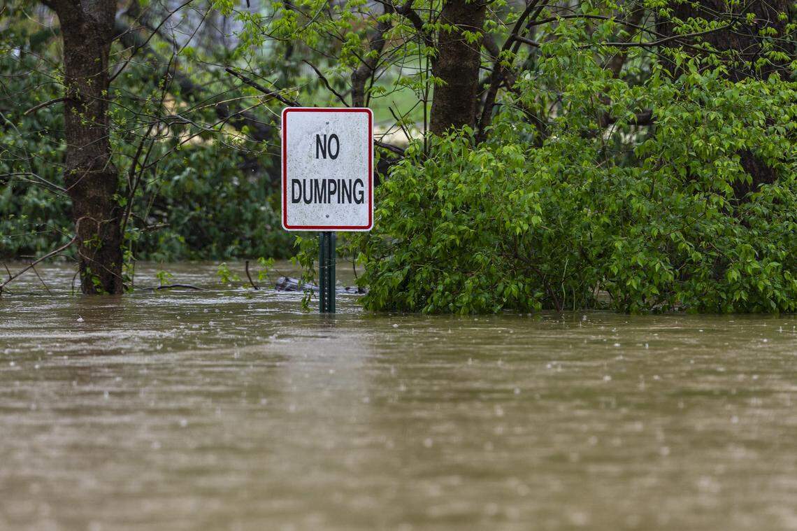 The Kentucky River floods Watson Court in downtown Frankfort, Ky., on Saturday, April 5, 2025.