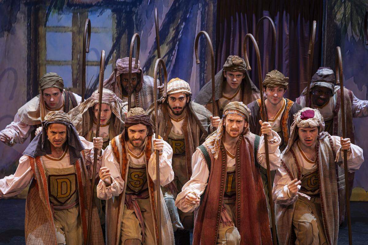 Joseph’s brothers sing and dance during a rehearsal of Joseph and The Amazing Technicolor Dreamcoat Monday, July 28, 2025, at the Lexington Opera House in Lexington, Ky.