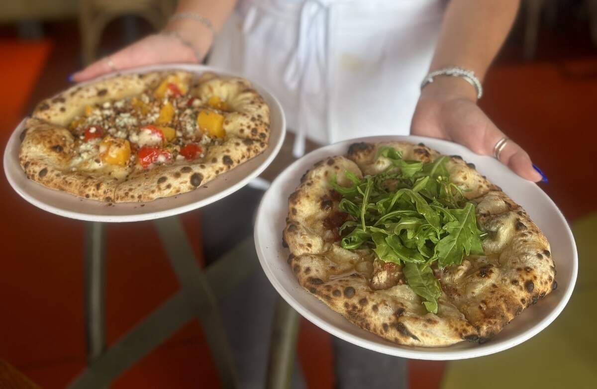 Two options from Smashing Tomato’s two locations, the Pesca at left, and the Sweet Pollo at right.