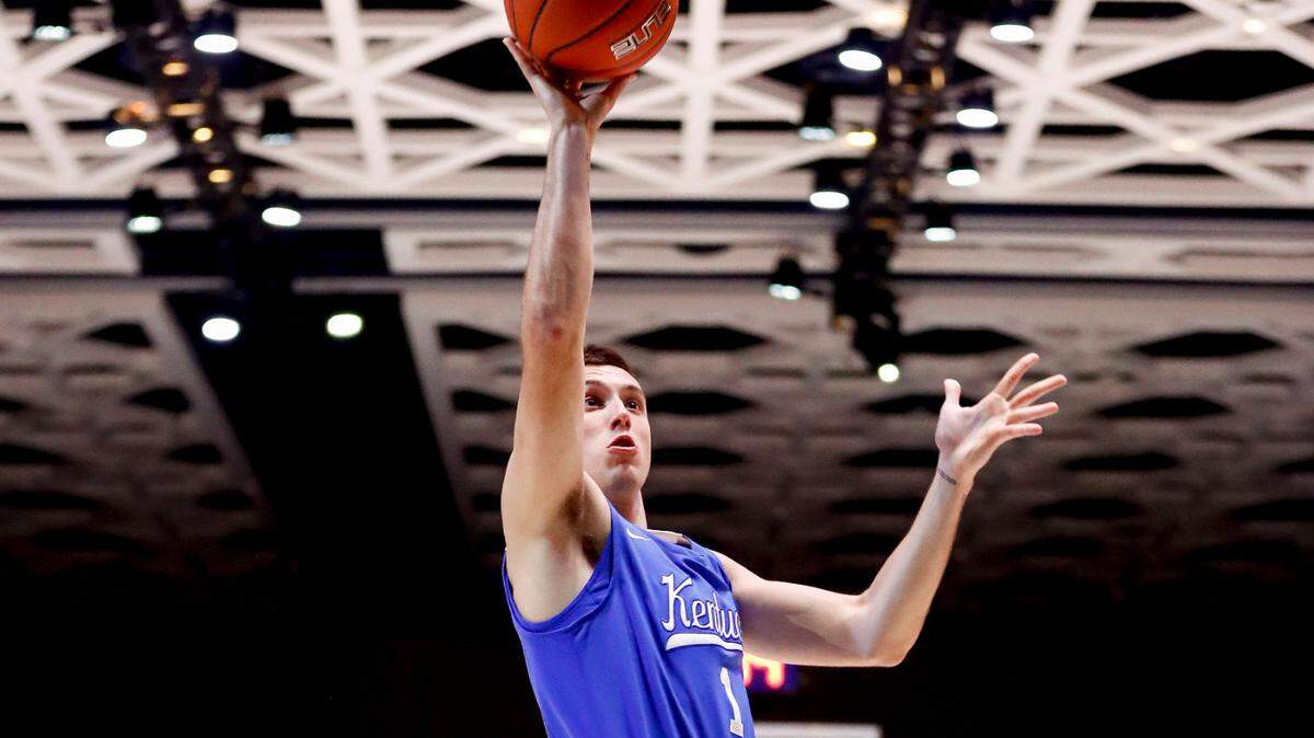 CJ Fredrick drives to the basket during Kentucky’s 102-40 victory over Tec de Monterrey in the Bahamas.