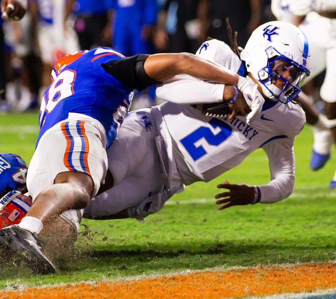 Kentucky quarterback Gavin Wimsatt (2) dives into to the end zone for a touchdown during the Wildcats’ 48-20 loss at Florida last week. Winsatt and UK will face Auburn this Saturday at Kroger Field.