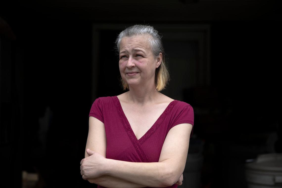 Crissy Howell stands for a portrait at her home in Floyd County, Ky., on Thursday, March 19, 2020. Howell is the mother of a fourth grade student who attends Betsy Layne Elementary School.