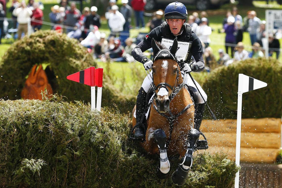 British rider Oliver Townend and Cooley Master Class, clearing brush at the Head of the Lake on Saturday, had a perfect round in the stadium jumping portion of the Land Rover Kentucky Three Day Event on Sunday, pulling off a huge upset in the last few minutes of competition.