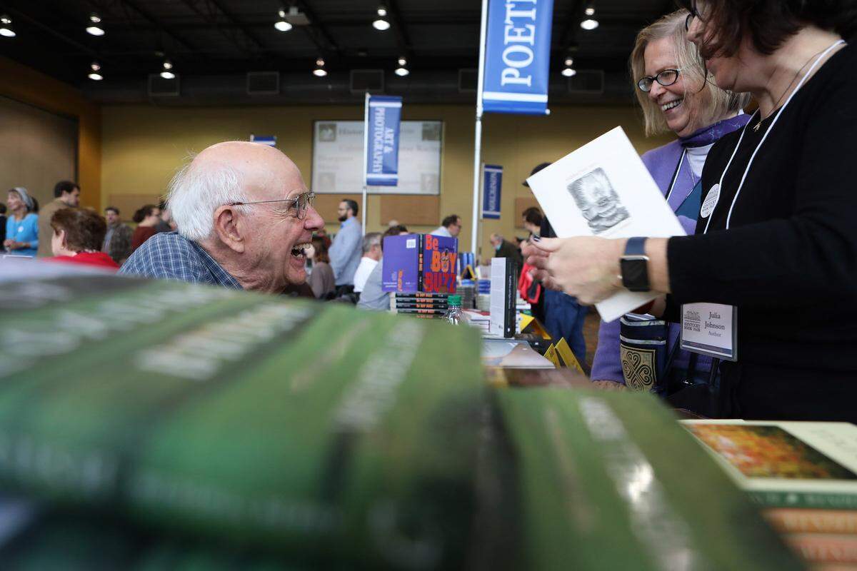 Authors Wendell Berry and Bobbie Ann Mason laughed while chatting at the 2017 Kentucky Book Fair in Alltech Arena at the Kentucky Horse Park. Both authors are scheduled to be at this years event.