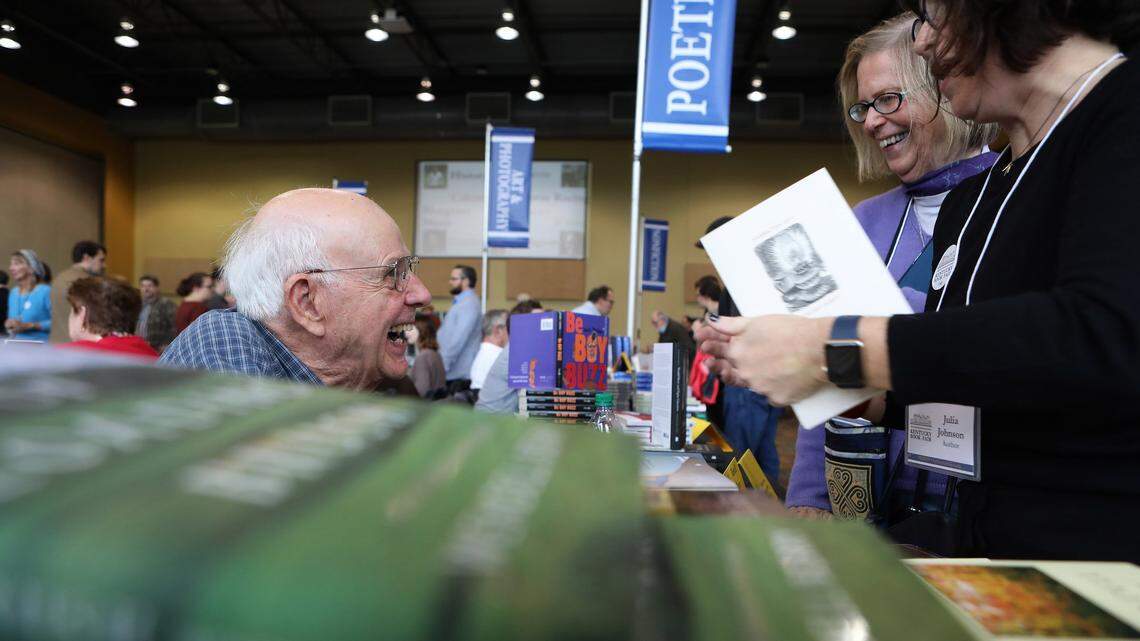 Authors Wendell Berry and Bobbie Ann Mason laughed while chatting at the 2017 Kentucky Book Fair in Alltech Arena at the Kentucky Horse Park. Both authors are scheduled to be at this years event.