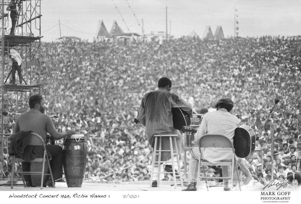 This August, 1969 photo shows Richie Havens as he performs during Woodstock in Bethel, N.Y. The photo is only one of hundreds made by photographer Mark Goff who, at the time, worked for an underground newspaper in Milwaukee, Wis. Some were published, but the negatives were filed away at his Milwaukee home and barely mentioned as Goff raised two daughters, changed careers and, last November, died of cancer. Dozens of Goff’s Woodstock shots are being displayed 50 years later. (Mark Goff Photography, Leah Demarco/Allison Goff via AP)