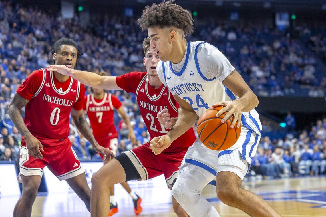 Kentucky center Malachi Moreno (24) drives the ball as Nicholls guard Nick Krass (21) defends during UK’s win Tuesday night at Rupp Arena. 