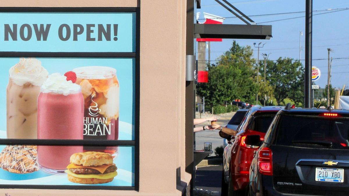 Cars line up in the drive-thru for coffee at The Human Bean on Richmond Road in Lexington on Friday, Aug. 18, 2023. The coffee chain opened two Lexington locations recently. This Richmond Road spot faces intense nearby competition from 7 Brew, Panera, Krispy Kreme, Starbucks, Common Grounds and a recently shuttered a LaRosa’s that will become a Dunkin’.