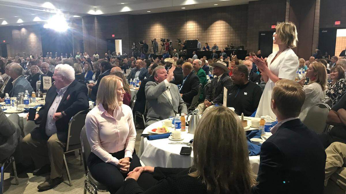 Kelly Craft, husband Joe and Central Bank made the $5 million bid that ended up winning the annual Country Ham Breakfast and Auction at the Kentucky State Fair.
