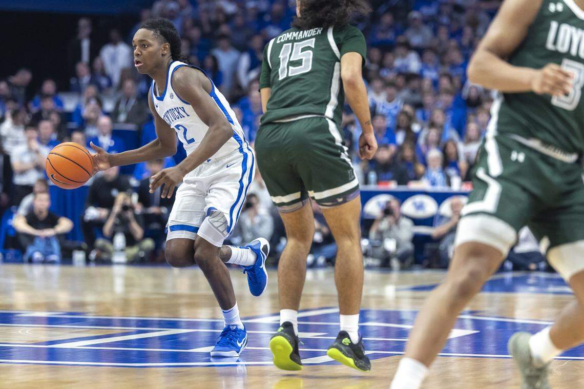 Kentucky basketball guard Jasper Johnson (2) drives the ball past Loyola (Maryland) guard Tyson Commander (15) during their game at Rupp Arena on Nov. 21.