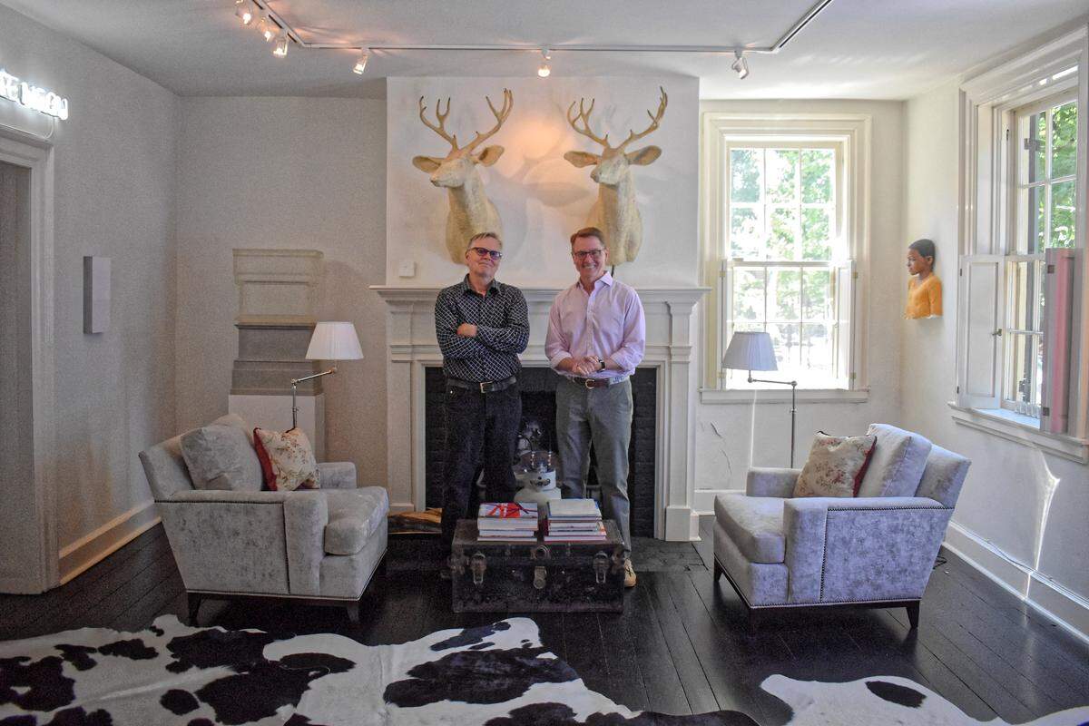 Moveable Feast vice president Bob Morgan (left) and former Lexington Mayor Jim Gray in Gray’s living room, where they’ll host a Sunday Salon on Sept. 29.