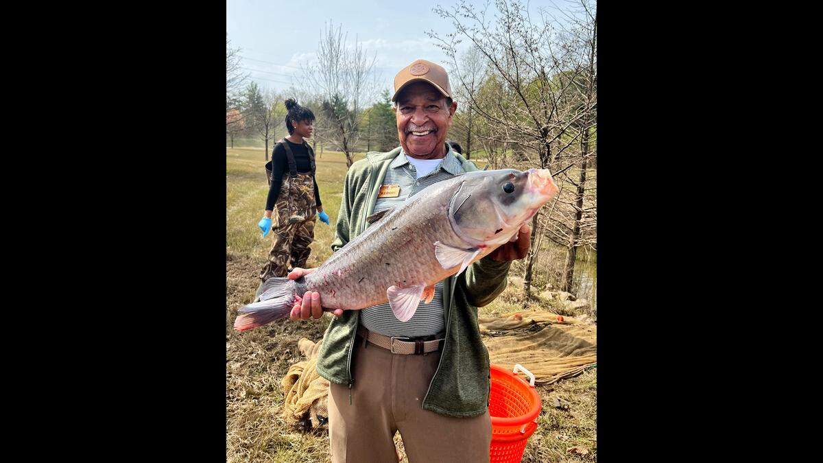 Freddie Johnson, Buffalo Trace Distillery’s VIP Visitor Lead, helped rescue fish stranded in a pond on the distillery’s property from the historic April flood.