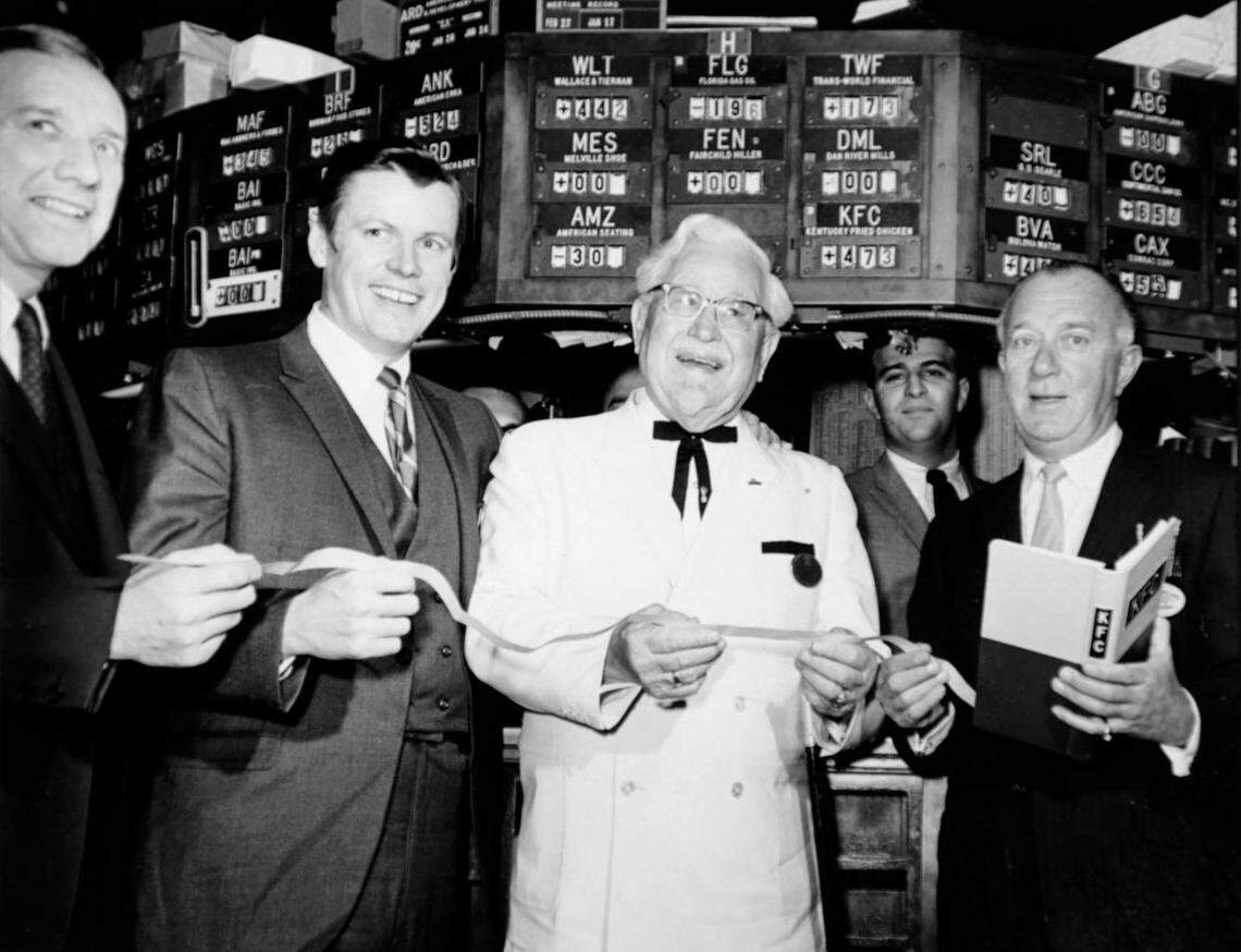 John Y. Brown, Jr. and Col. Harland Sanders with officials of New York Stock Exchange in 1968. Photo Courtesy John Y. Brown, Jr.