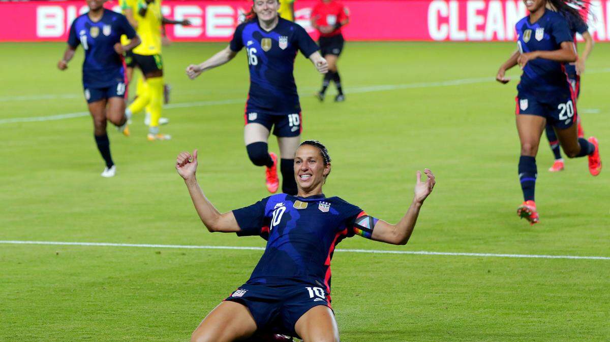 USA forward Carli Lloyd (10) slides on the turf after scoring a goal against Jamaica during the first half of their 2021 WNT Summer Series match Sunday, June 13, 2021, in Houston. (AP Photo/Michael Wyke)