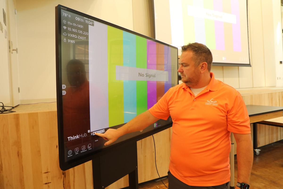 Joe Brewer, director of technology and facilities for the College of Design, demonstrates how technology can be used in classes during a tour of the historic Gray Design Building at the University of Kentucky on August 9, 2024.