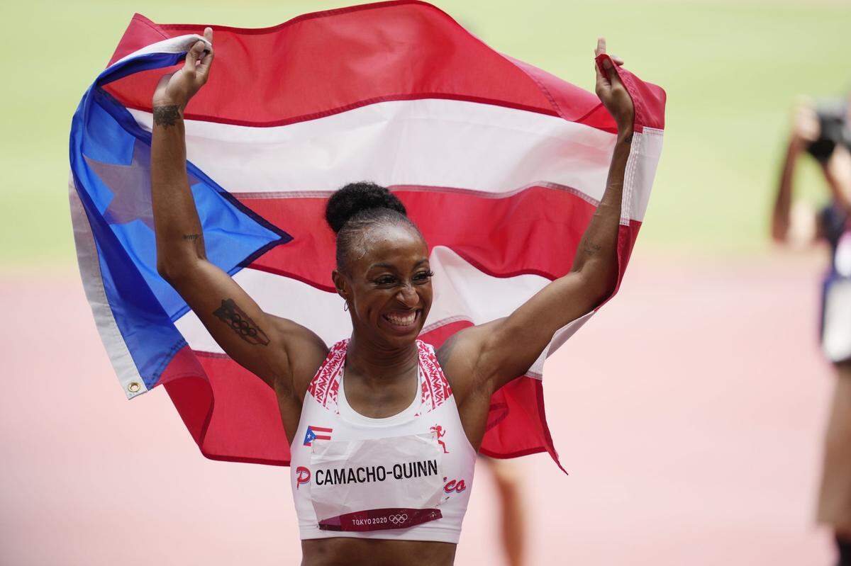 Aug 2, 2021; Tokyo, Japan; Jasmine Camacho-Quinn (PUR) reacts after winning the women's 100m hurdles final during the Tokyo 2020 Olympic Summer Games at Olympic Stadium. Mandatory Credit: Andrew Nelles-USA TODAY Sports