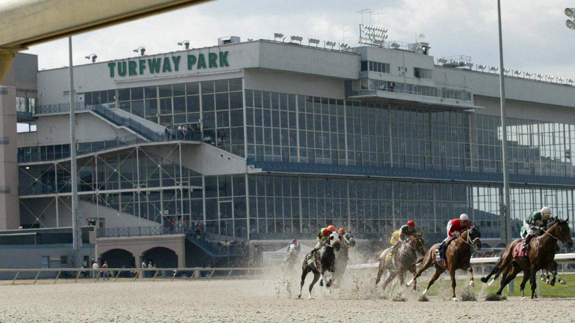Horses race on the new Polytrack surface at Turfway Park Saturday September  17, 2005 in Florence, KY.