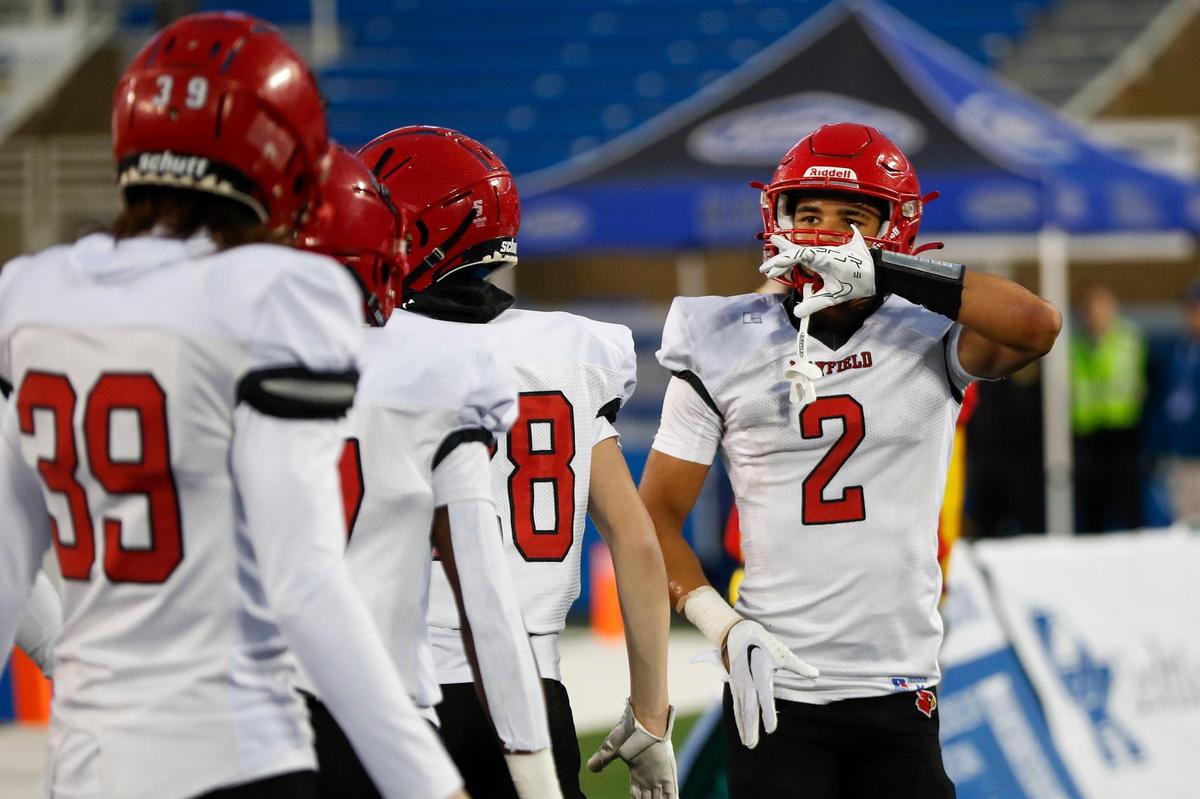 Mayfield’s Xavier Biggers (2) celebrates his kickoff return for a touchdown during Friday’s game at Kroger Field.