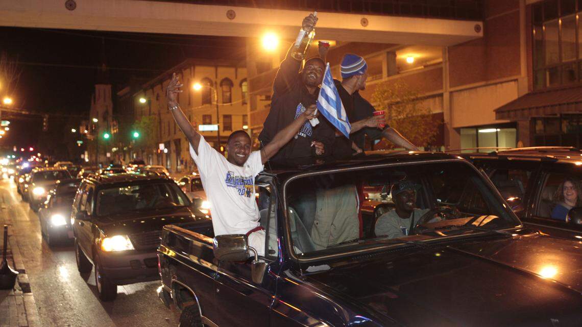 These Kentucky fans rolled along Broadway on Monday night, sharing the euphoria of the Wildcats' NCAA championship.  