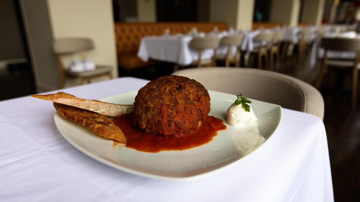 The Polpette Di Carne Damiano, a 23-ounce meatball offered at Frank and Dino’s on West Short Street. The new restaurant is in the historic Security Trust Building.