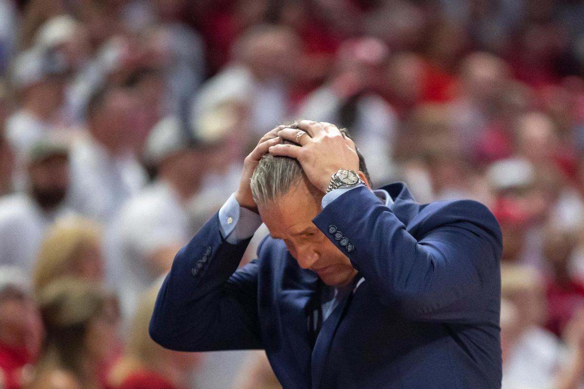 Kentucky Wildcats head coach John Calipari reacts to a foul called against the Wildcats during a game against the Arkansas Razorbacks at Bud Walton Arena in Fayetteville, Ark., on Saturday, Feb. 26, 2022.