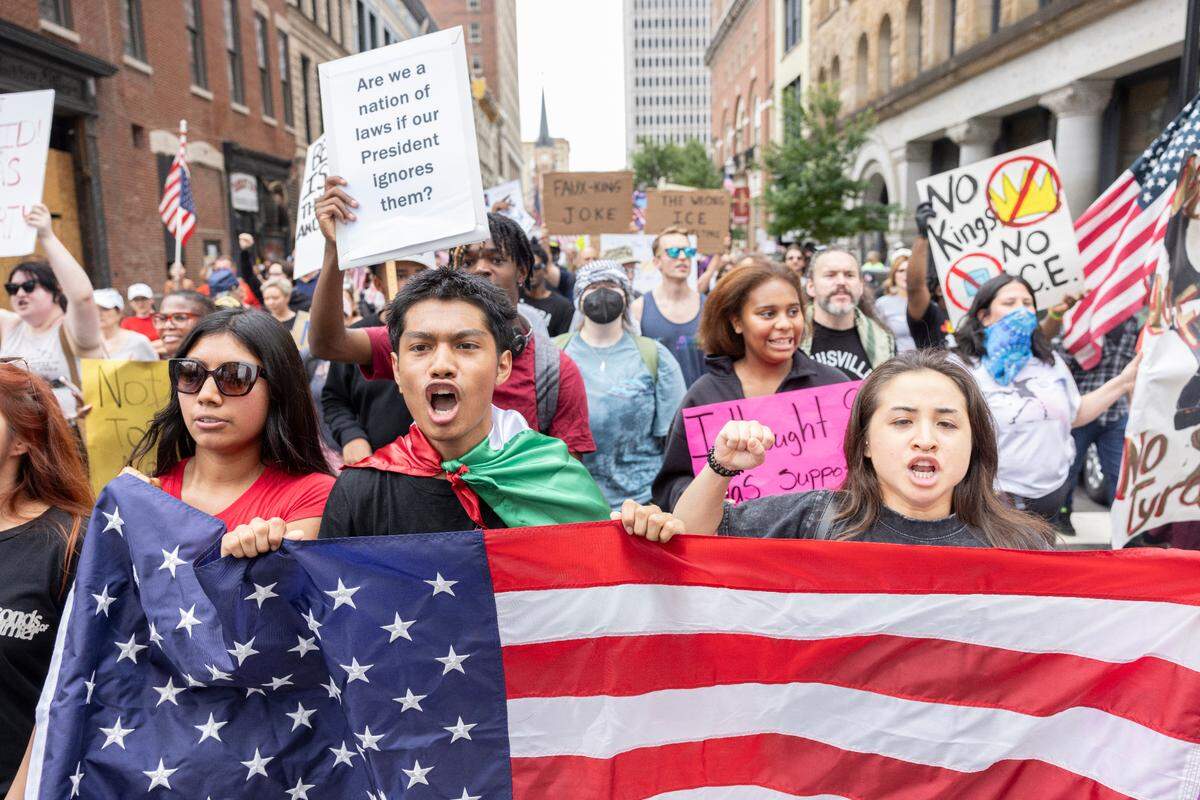 Thousands of demonstrators gathered during the ‘No Kings’ march and protest at Metro Hall in downtown Louisville, Kentucky, Saturday, June 14, 2025. ‘No Kings’ rallies organized across the United States in direct response to President Donald Trump’s military parade in Washington D.C.