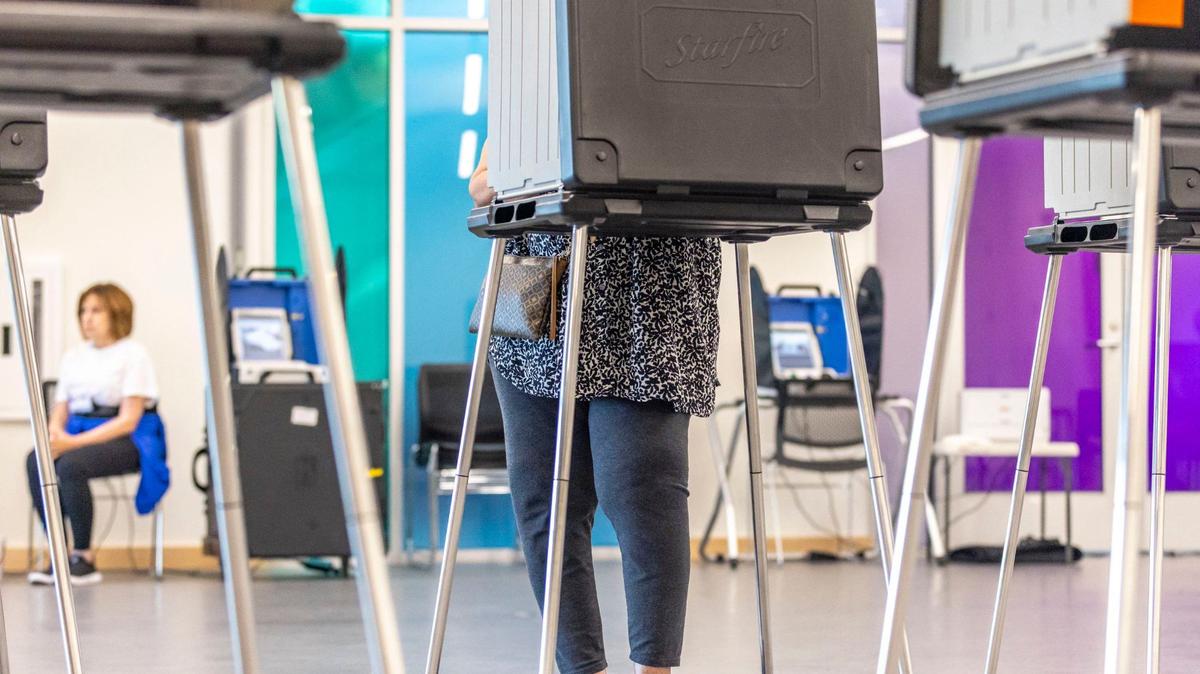 A voter completes their ballot at Lexington Public Library’s Marksbury Family Branch in Lexington, Ky., on Tuesday, May 21, 2024.