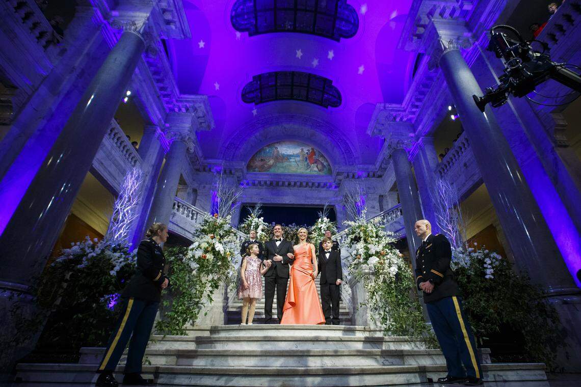 Kentucky Gov. Andy Beshear, First Lady Britainy Beshear and their two children Will and Lila Beshear make their entrance during the Grand March in the state Capitol in Frankfort, Ky., Tuesday, Dec. 10, 2019