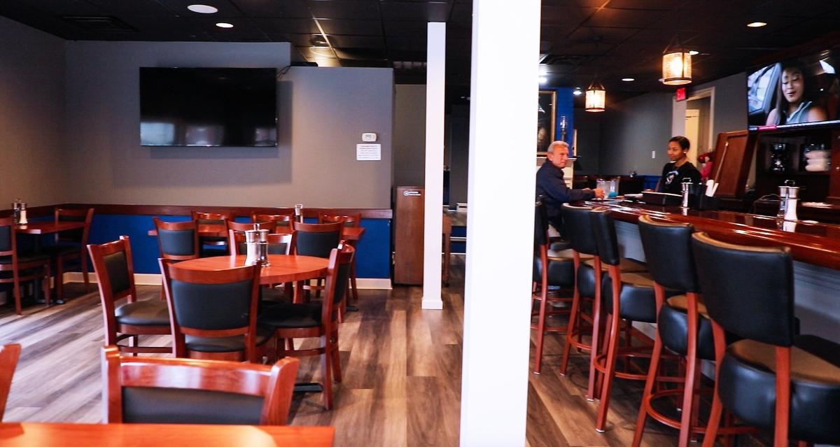 Main seating and bar area of Sassy Bleu, the new Southern soul food restaurant located on the corner of Woodland and High.