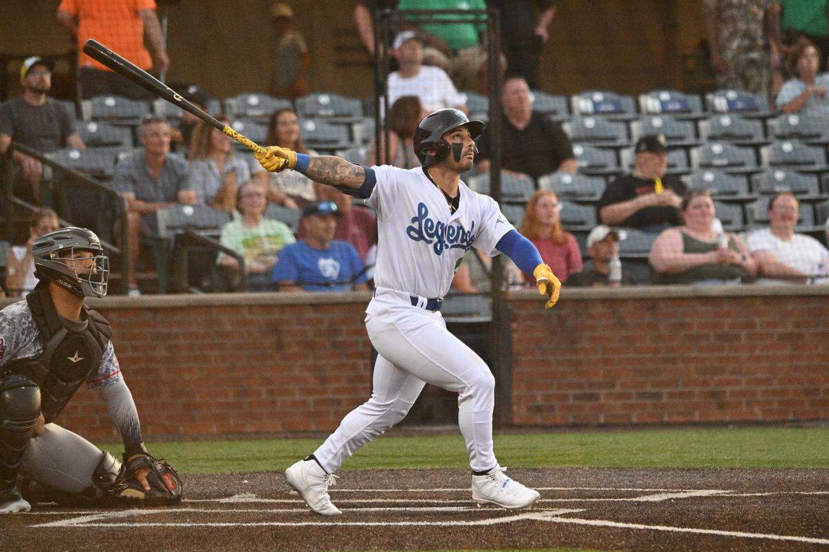 The Lexington Legends’ EJ Cumbo hits his first professional home run against the High Point Rockers at Legends Field on June 20.