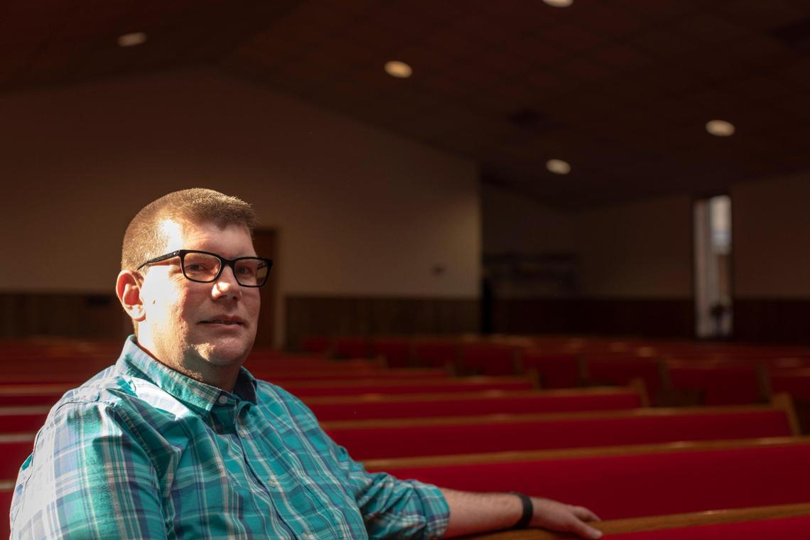 Pastor Sean Daniels poses for a portrait at Friendship Missionary Baptist Church in Cawood, Ky., Friday, April 9, 2021. Daniels was the first church leader in Harlan County to received the vaccine and has tried to explain to hesitant members of the church in Cawood about the vaccine saying ÒIÕm just trying to keep you safe,Ó.