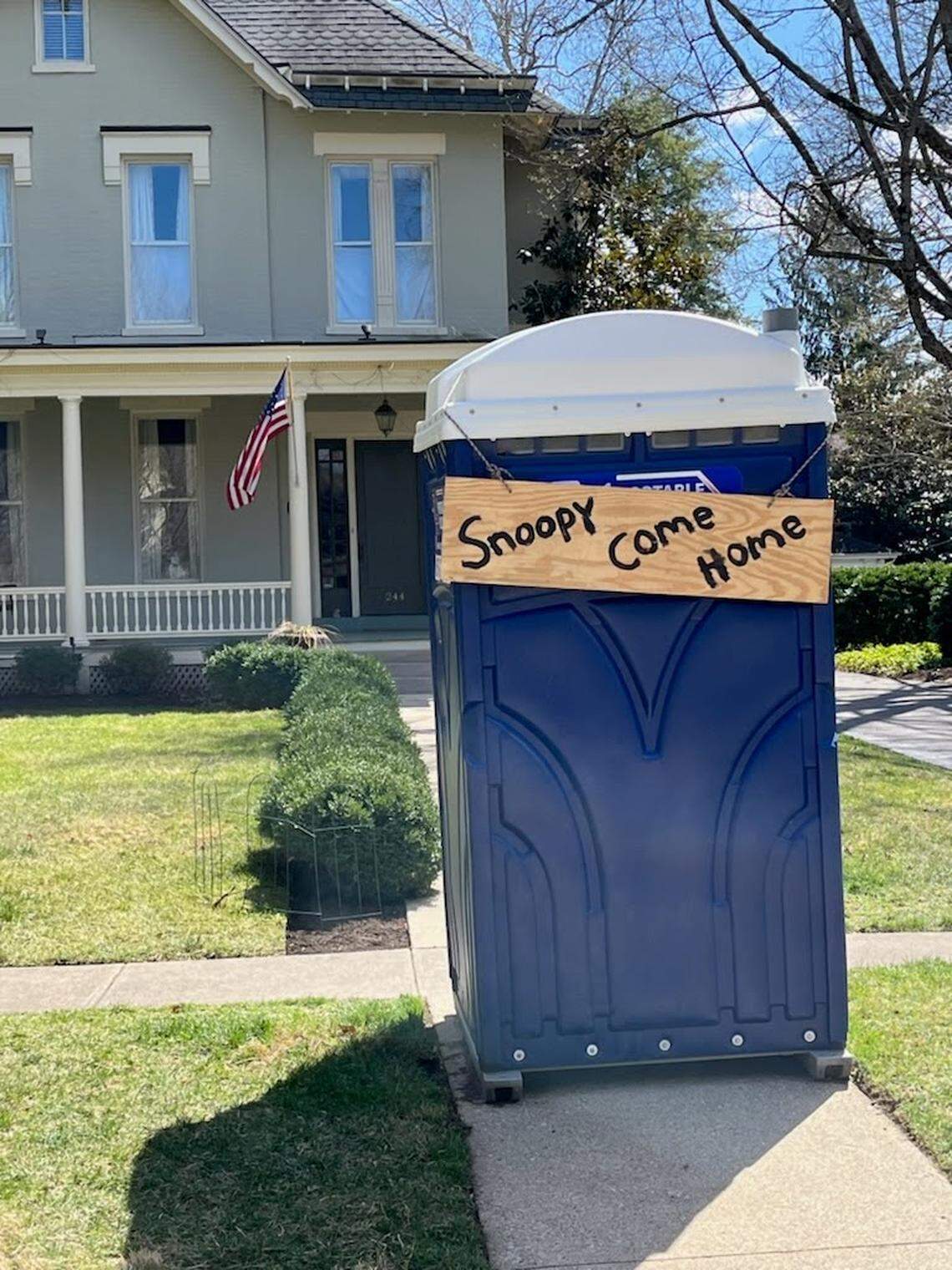 There’s now a sign on the portable toilet in front of 244 S. Ashland, where Reese and Becky Reinhold live, that says Snoopy Come Home in the hopes that their ornament will be returned.